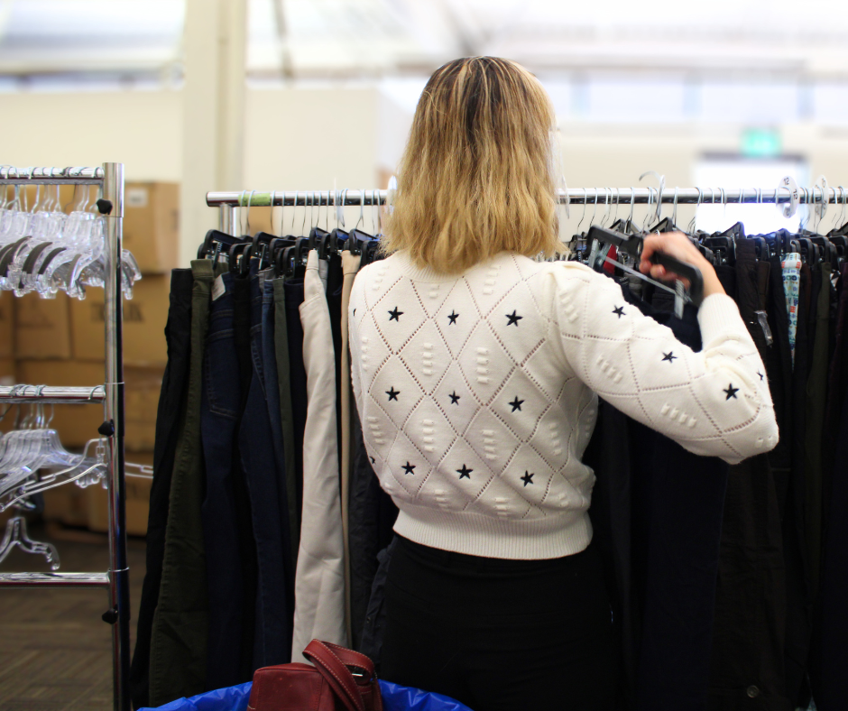 a group of retail workers in a clothing store